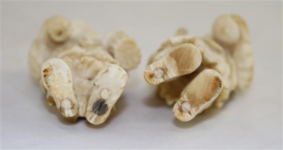 A pair of 19th century Dieppe ivory carvings of an elderly man and woman, 4.25in.